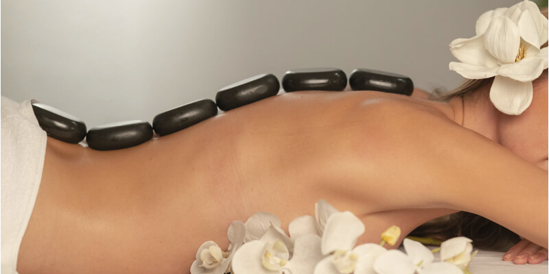 Spa treatment with hot stones on the back